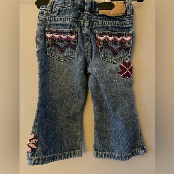 Levi’s  I adorable flower blue jeans. 12 months - Picture 2 of 10